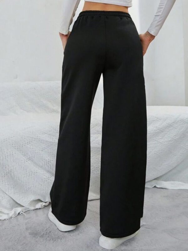 ADDICTED ATTIRE Women Solid Bell Bottoms Loose Fit Joggers - Image 3